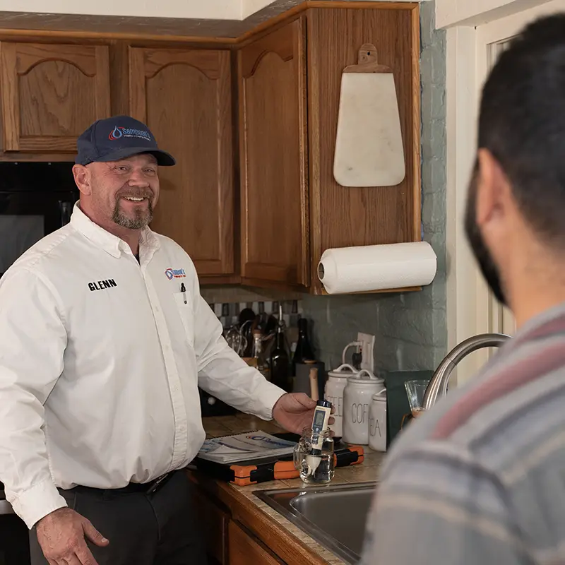 Glenn Sampson analyzing a client's water